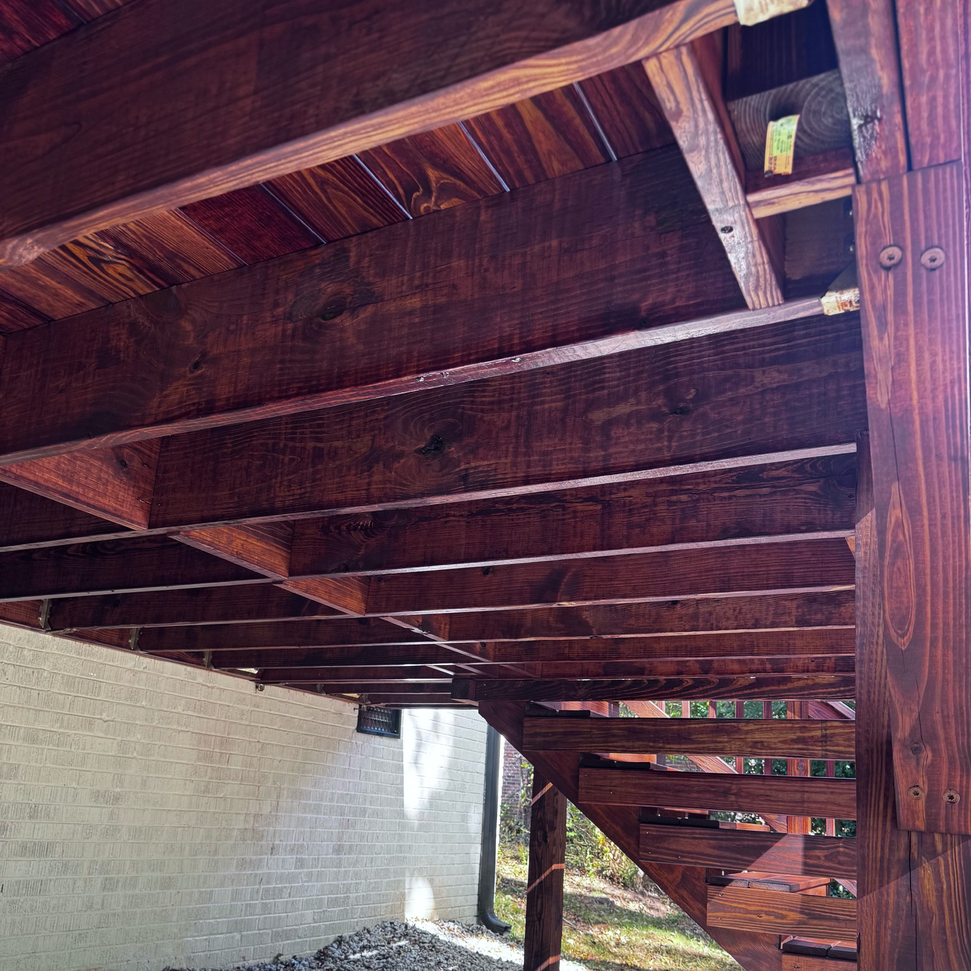 Stained wooden deck stairs